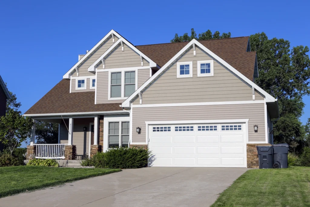 a tan siding new home