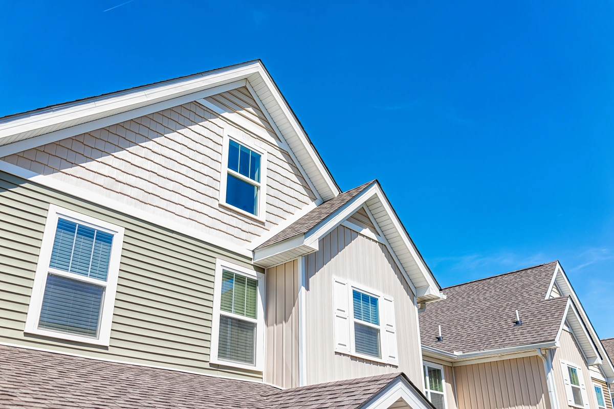 tan siding new suburb home