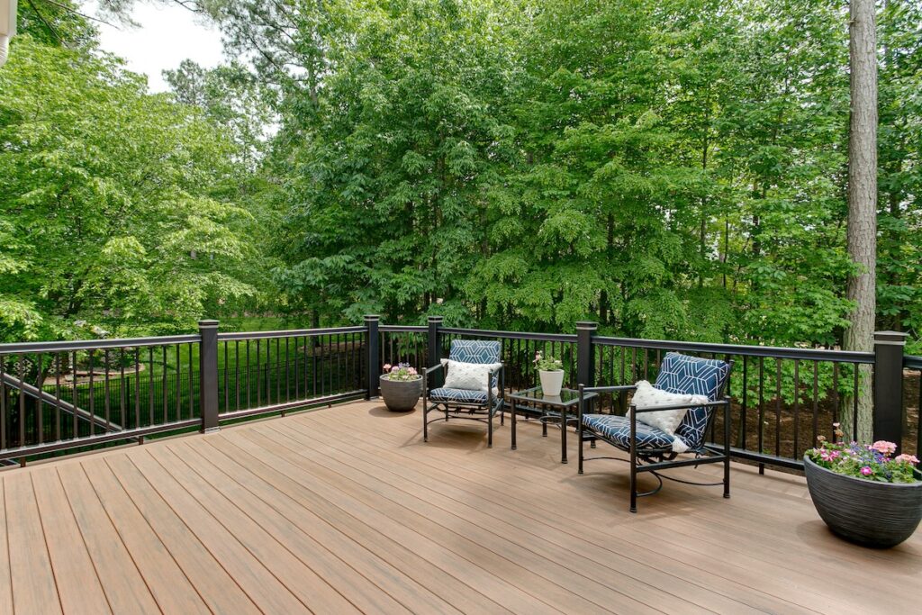 Beautiful Summer Staged Deck with Nature Woods and a Flower Pot