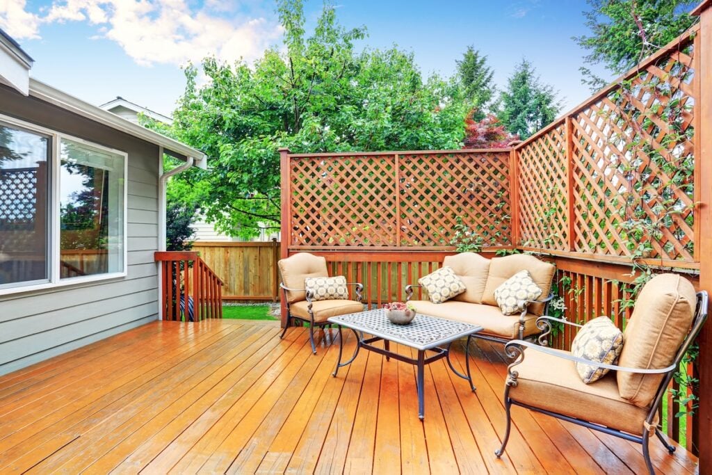 Spacious wooden deck with patio area and attached pergola. Northwest, USA