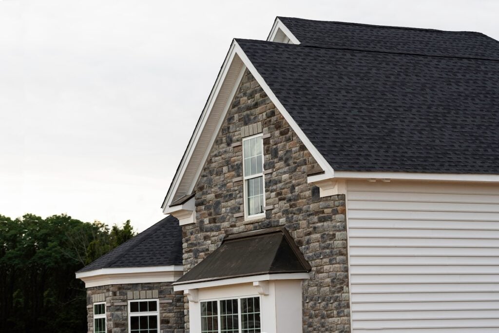 edge of roof shingles on top of the house dark asphalt tiles on the roof background color certainteed shingle colors