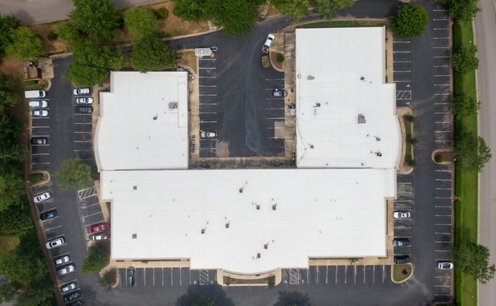 flat roof repair Drone Images of Flat Commercial TPO Roofs: Sunny, No People, Industrial