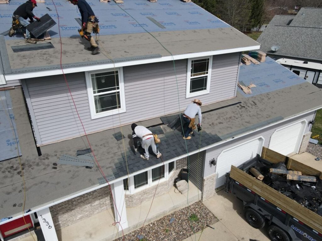 People working on a roof