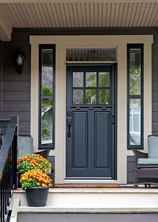 front door colors black door flowers on stairs