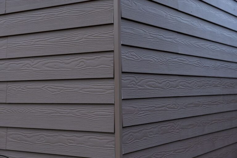 gray horizontal siding with a wood grain texture