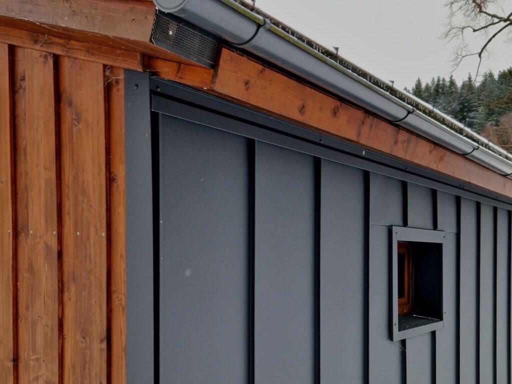 The dark panels are a style called Standing Seam Metal Siding