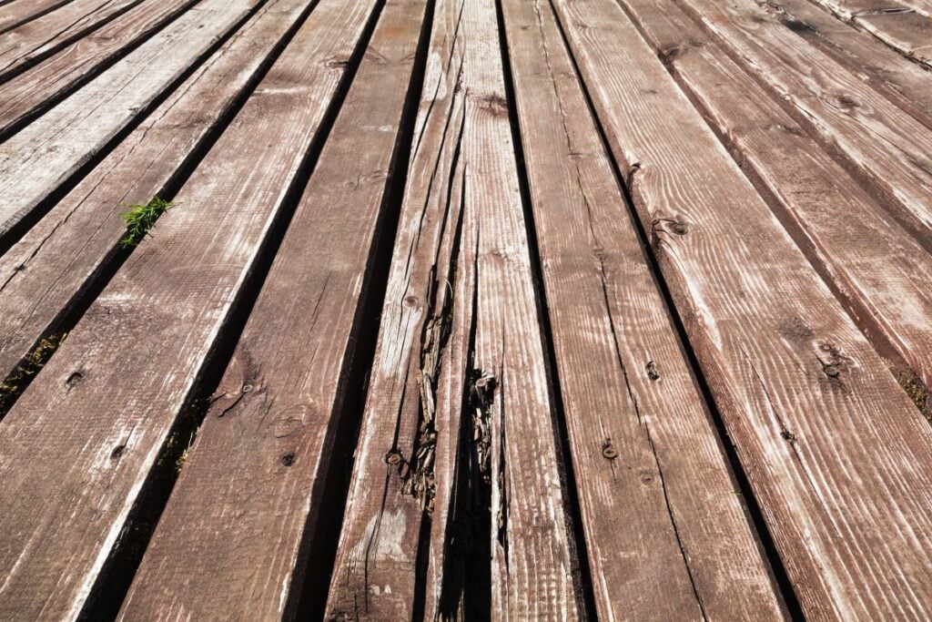 Old damaged wooden deck in need of repair
