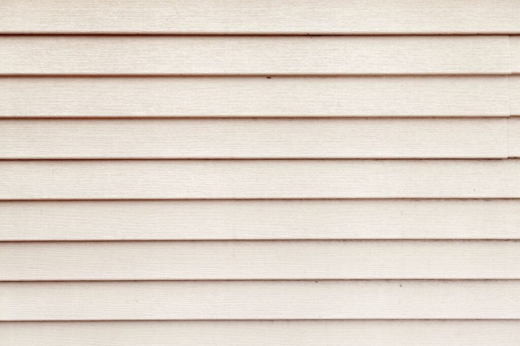 White siding on old house