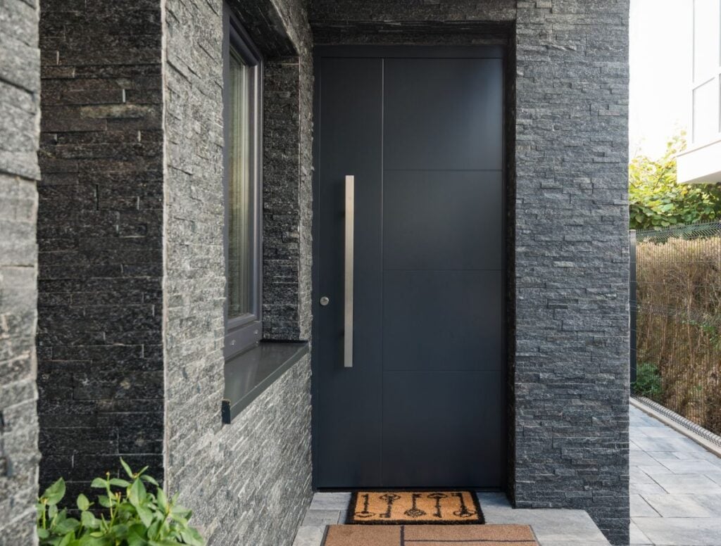 Entrance fiberglass door into modern house