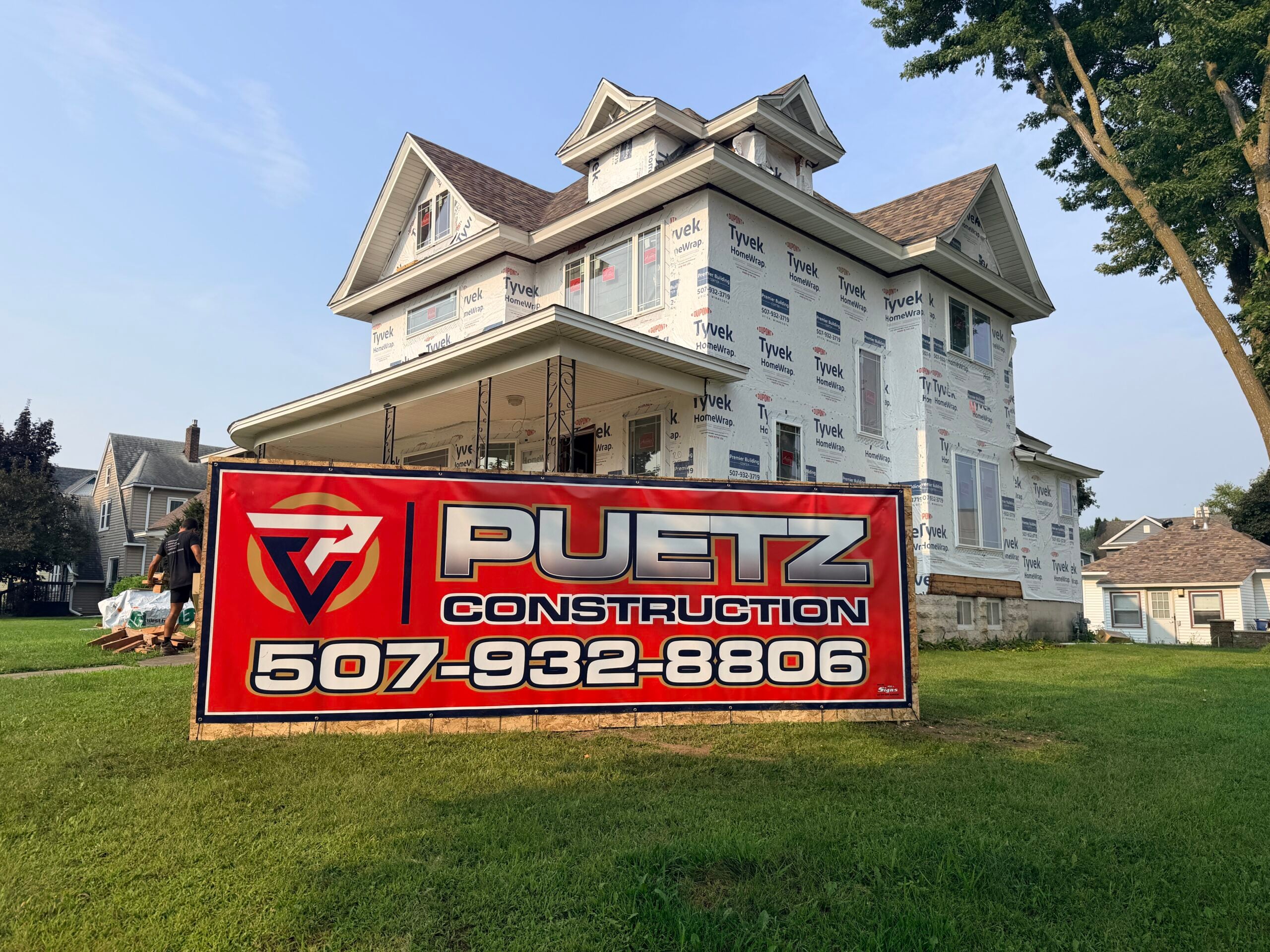 Puetz Construction sign in front of full remodel project in St. Charles Mn.