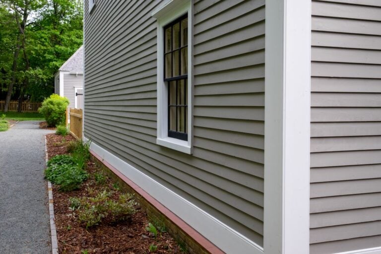 James Hardie Siding Colors, tan colored house with white trim and black wood window frame spacers