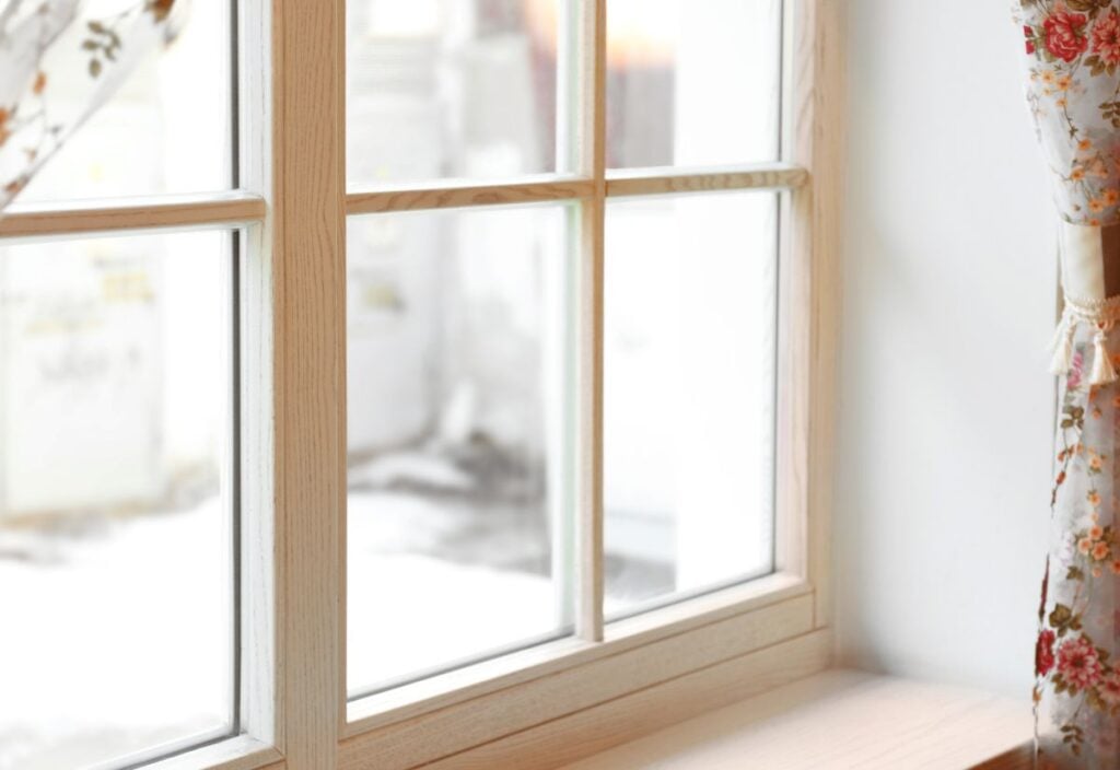 wooden window and flowery curtains