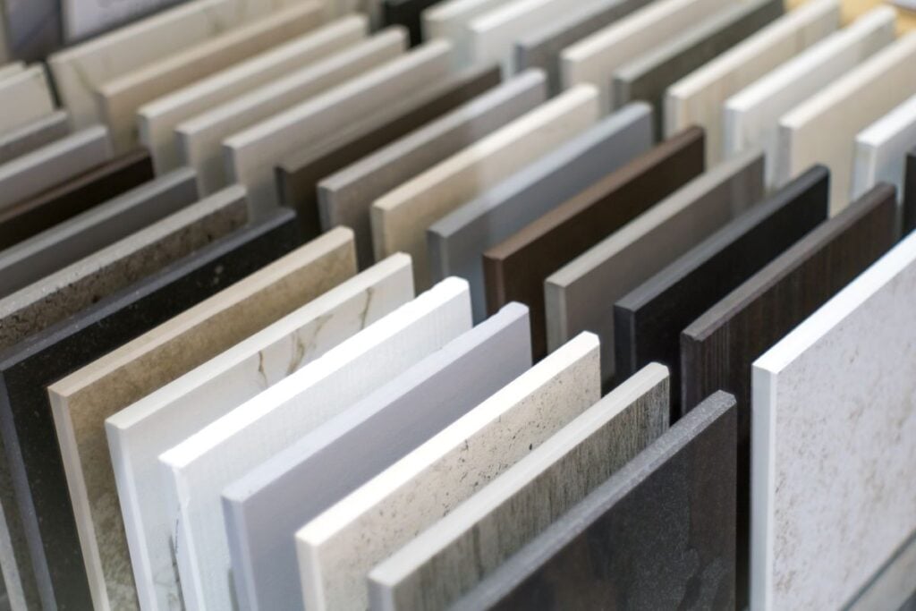 Close up of quartz kitchen countertop samples showing many different colors