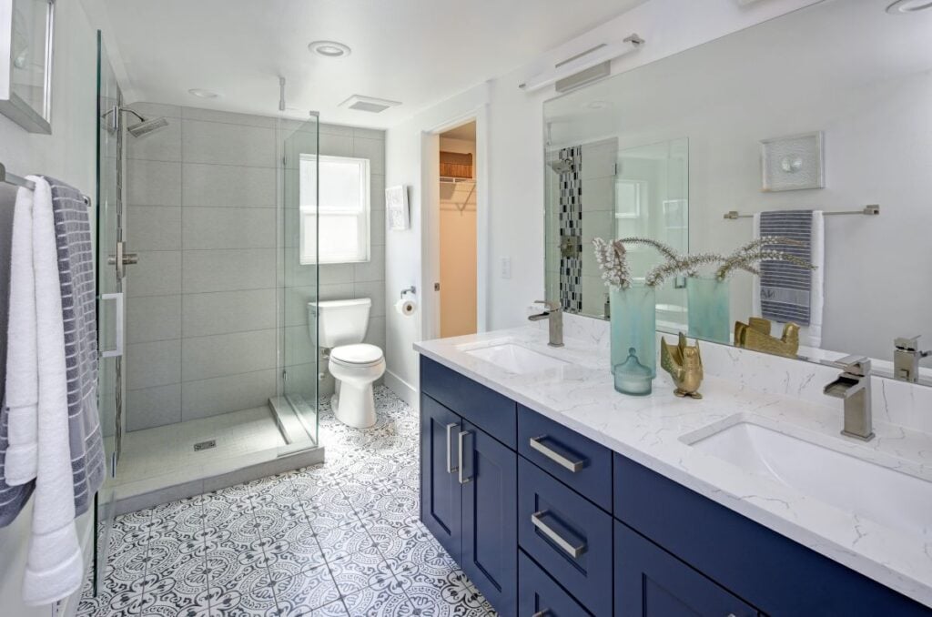 Modern bathroom interior with blue double vanity
