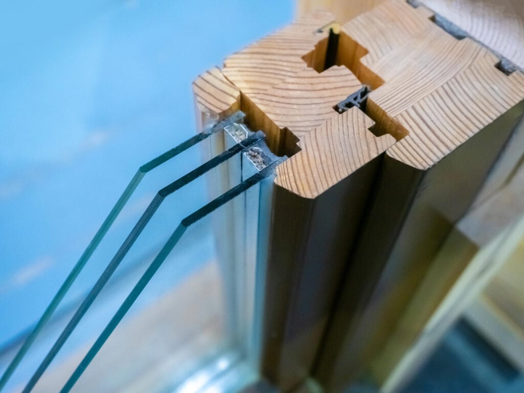 Window device with triple glass